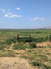 looking north by the fenced area of property