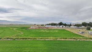View of yard with a mountain view and a view of rural / pastoral area