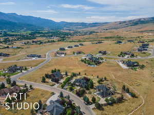 Aerial overview of property's location with mountains
