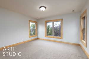 Unfurnished room with carpet floors