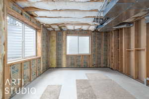 Misc room with healthy amount of natural light