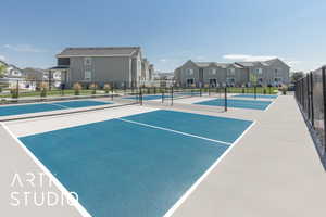 View of community with a tennis court and a residential view
