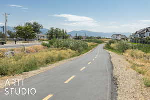 View of asphalt street with a mountain view and a residential view