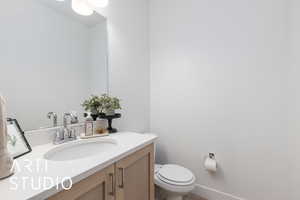 Bathroom with vanity and toilet