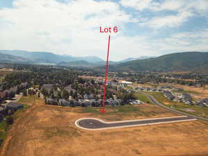 Aerial view of residential area with a mountain backdrop