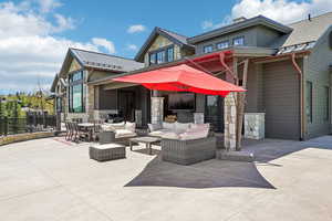 View of patio with outdoor lounge area