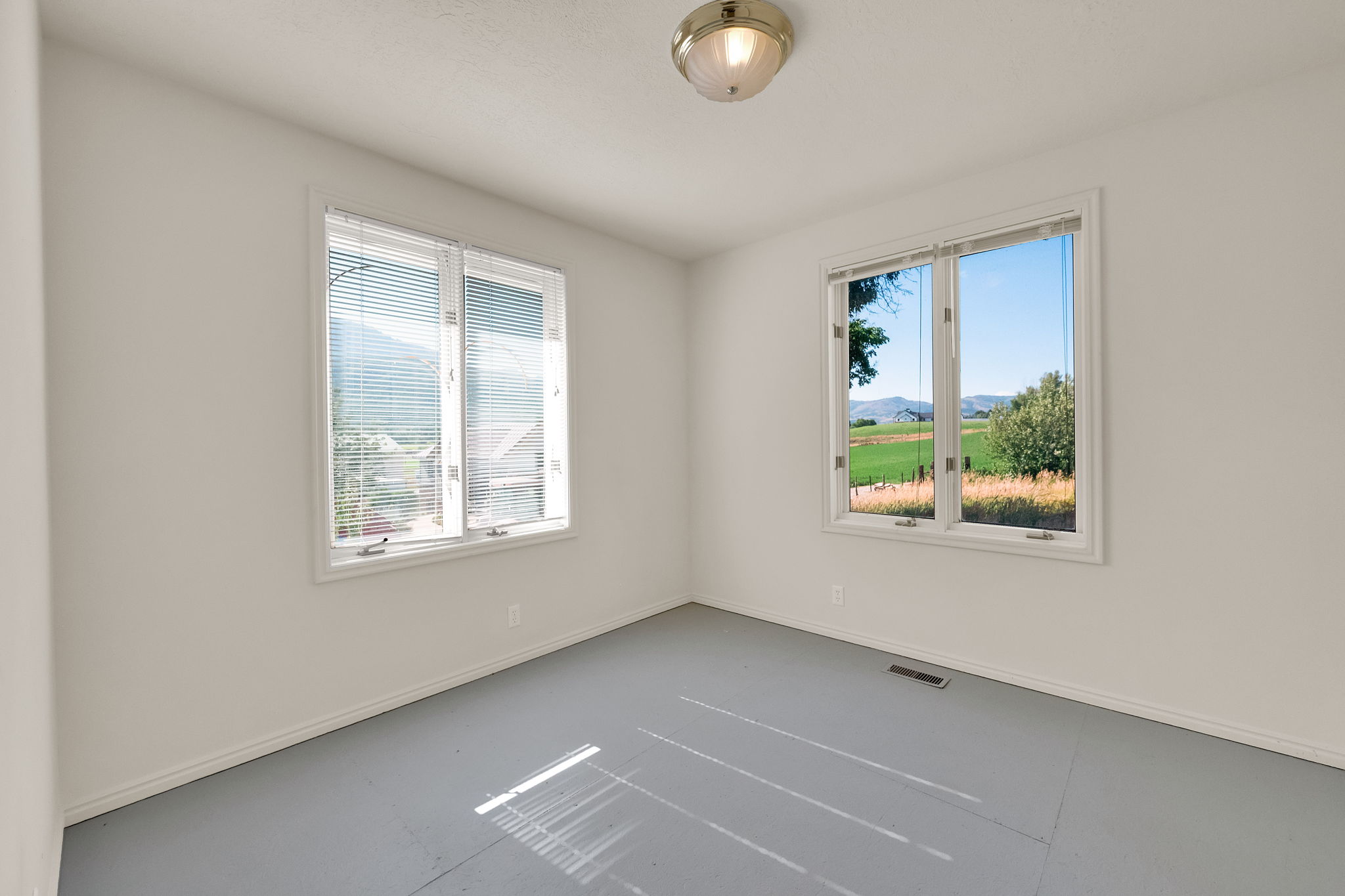 Empty room with healthy amount of natural light