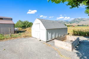 View of shed with a mountain view