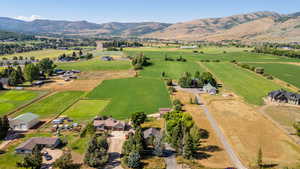 Aerial view of sparsely populated area with a mountainous background