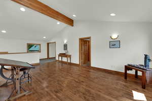 Living room featuring wood finished floors and recessed lighting