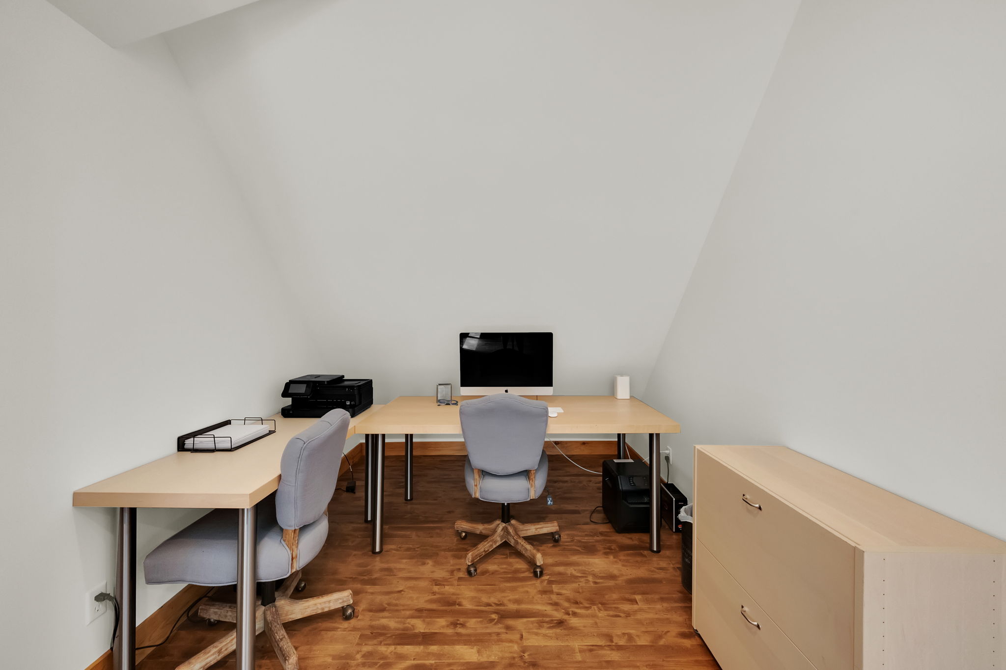 Office space with wood finished floors