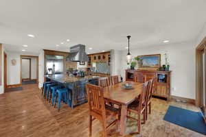 Dining room featuring recessed lighting and light wood-style floors