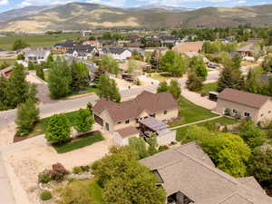 Aerial perspective of suburban area featuring mountains