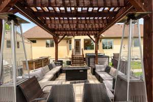 View of patio / terrace with an outdoor living space and a pergola