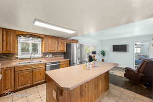 Kitchen - hands free faucet, tile floors