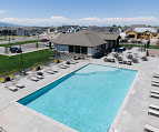 Community pool featuring a patio