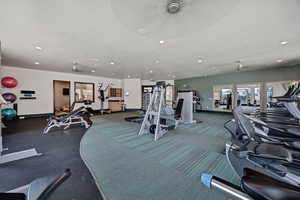 Clubhouse - Exercise room with recessed lighting and baseboards