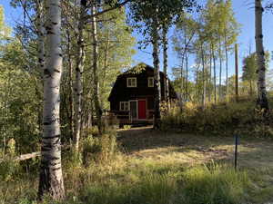 View of front facade with a deck