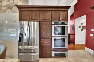 Kitchen with stainless steel appliances and a warming drawer