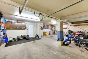 Garage featuring a garage door opener