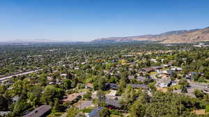Aerial view of residential area featuring mountains