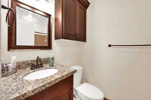 Bathroom featuring toilet and vanity