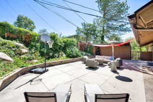 View of patio with an outdoor living space