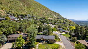 Aerial view of residential area with a mountainous background
