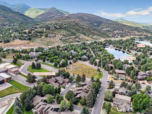 Aerial view of Silver Springs  featuring two small lakes and mountain view
