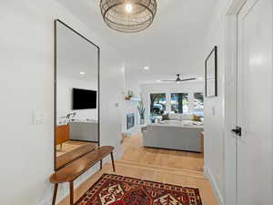 Entry with large walk in closet, powder room and  steps to living room