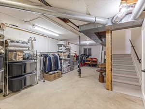 Unfinished below grade basement with stairway. Option to add 4th bedroom, bath and fireplace!