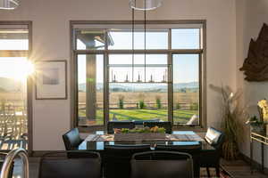 Dining space with plenty of natural light and a view of rural / pastoral area