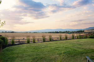 View of yard with a view of countryside and a mountain view