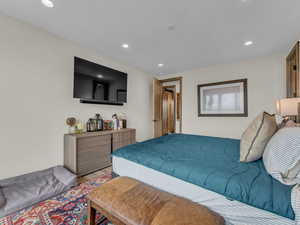 Bedroom with recessed lighting and light wood-type flooring