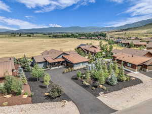 View of subject property featuring a mountain backdrop