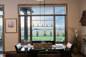 Dining room with healthy amount of natural light and a mountain view
