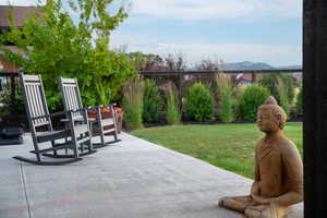 View of patio / terrace with a mountain view