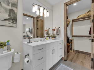 Bathroom with vanity, recessed lighting, and tile patterned flooring