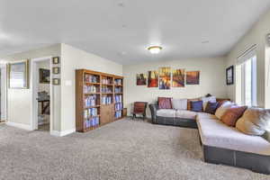 Upstairs Living room featuring baseboards