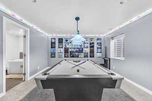 Large Family room featuring pool table (Included) and carpet floors