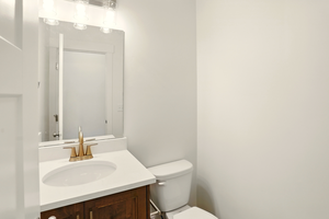 Bathroom featuring toilet and vanity
