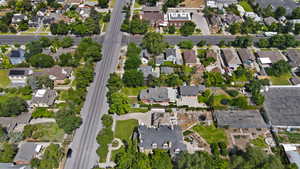 Aerial overview of property's location featuring nearby suburban area