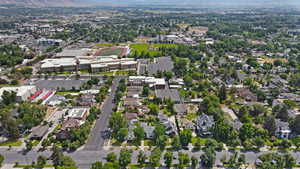 Aerial overview of property's location with nearby suburban area