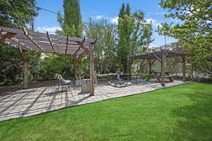 View of patio with a pergola