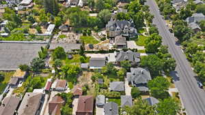 Aerial overview of property's location featuring nearby suburban area