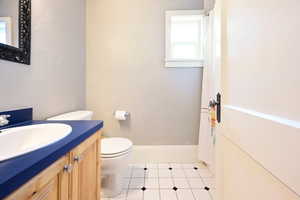Bathroom featuring vanity and tile patterned floors