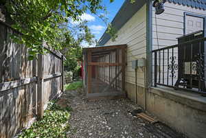 View of side of property with exterior structure