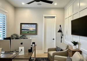 Home office featuring ceiling fan, light wood-style flooring, and recessed lighting