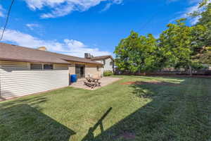 View of yard with a patio