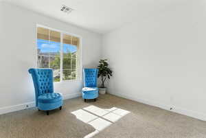 Unfurnished room with carpet flooring and baseboards
